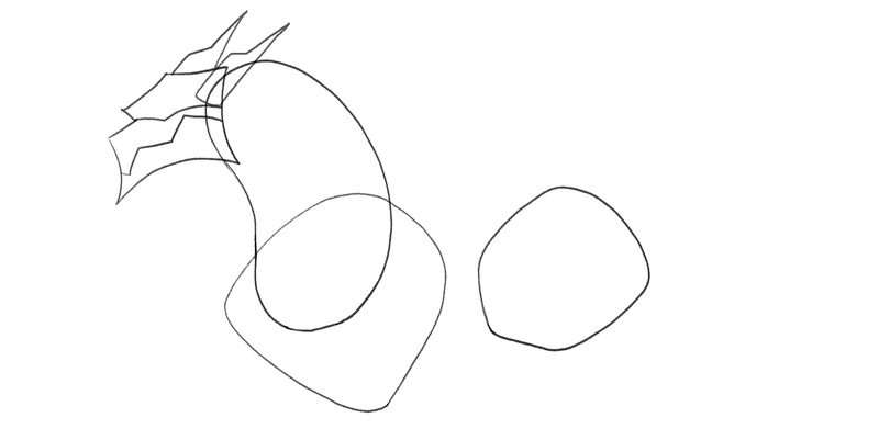 The outline of the dragon’s horns. The mouth line is also added to the sketch.
