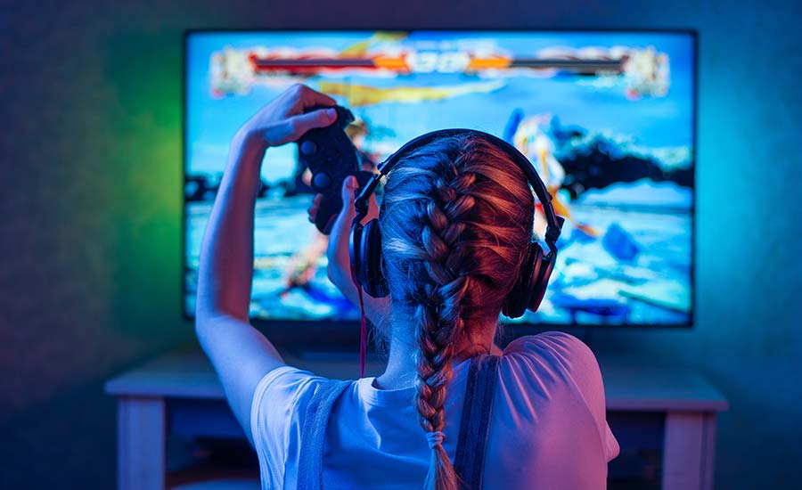 A female player playing a video game.
