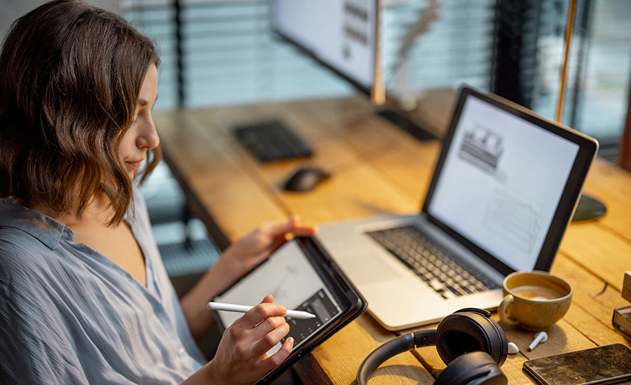 Stock illustration showing a person using a stylus pen.​